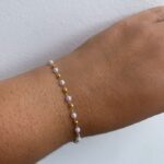 A pulseira pérola e bolinha