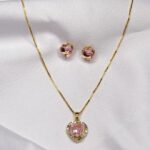 A Conjunto coração com pedra rosa