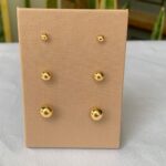 A Brinco bolinhas em trio